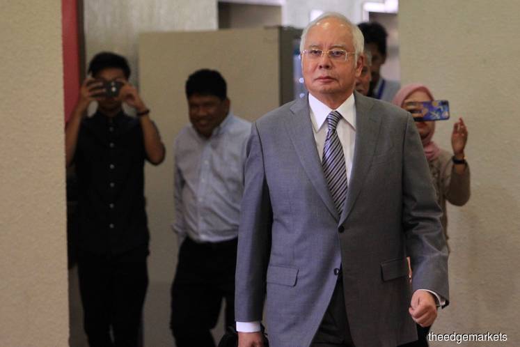 Najib asked to leave after prosecution objects to his presence in court